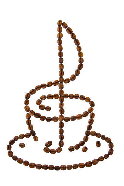 一杯咖啡和一个高音谱号。图片下载