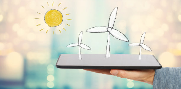 风车和一个拿着平板的人图片下载