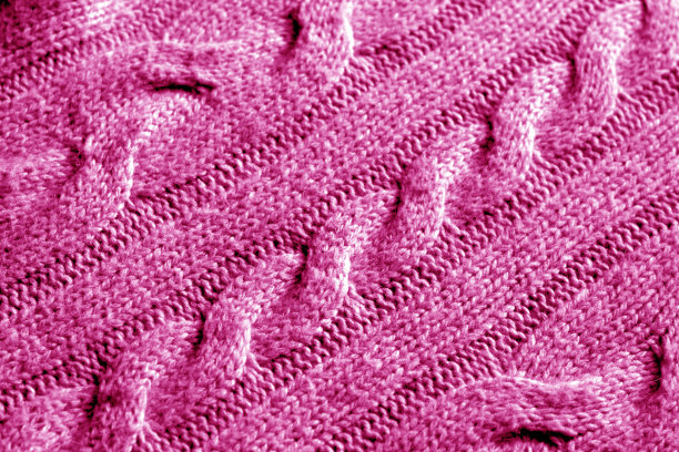 粉红色的针织图案。图片下载