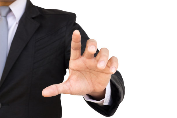 商人按屏幕上的白色背景。图片下载