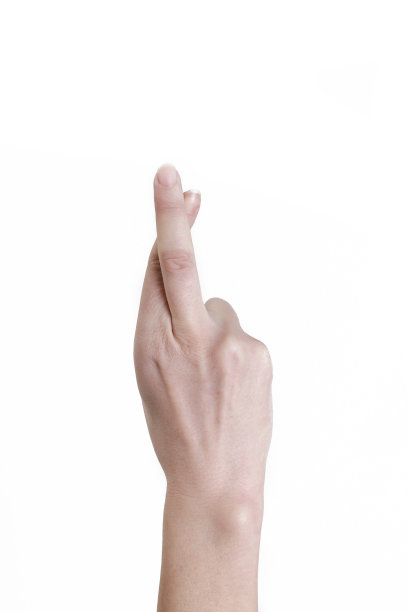 手指交叉在白色的背景上图片下载