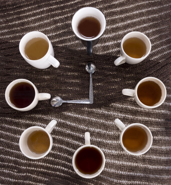 从茶或咖啡杯程式化的时钟概念图片下载
