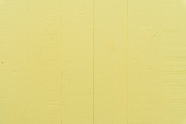 淡黄色的木桌背景纹理。图片下载