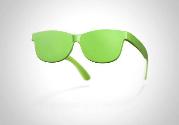 绿色眼镜概念上的白色背景图片下载