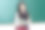 漂亮的少女拿着书看着相机素材图片