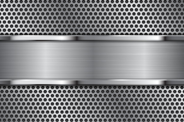 金属的背景。拉丝铁板上的穿孔纹理图片下载