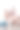 四人全家福。快乐的父母们在他们快乐的孩子们身后，金发的小女孩，黑发的男孩，坐在家里地板上的地毯上，个个面带微笑素材图片