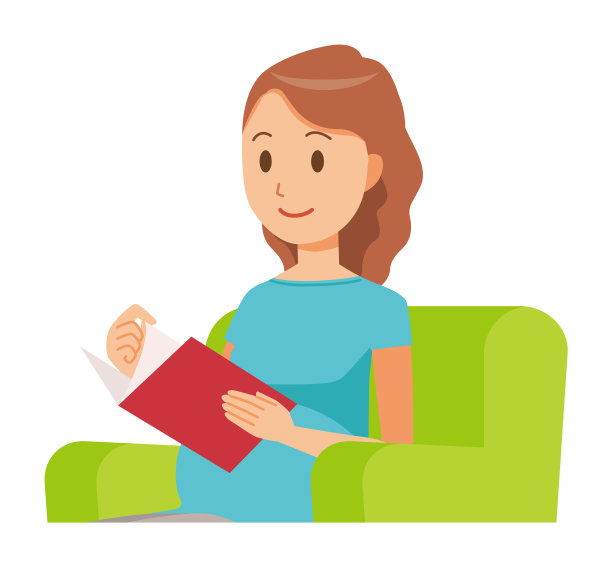 一个穿着绿色衣服的孕妇正在沙发上看书图片下载