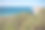 在大西洋海岸的一个悬崖上出租的房子与风景优美的全景图片下载