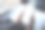 一个女人的手握黑色手机的空白白色桌面屏幕和笔记本电脑在咖啡馆桌上的模型图像图片下载
