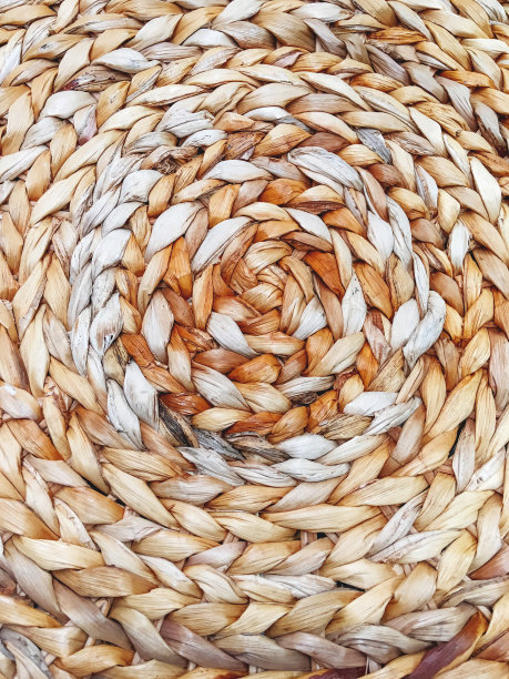 近距离照片表面编织的稻草。用于家具和室内的天然材料。图片下载