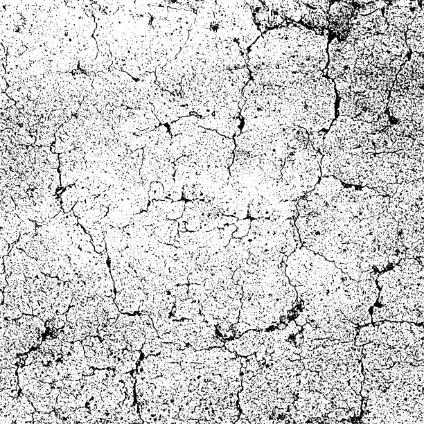 黑色和白色垃圾纹理背景。石头损坏的墙壁上有裂缝。图片下载