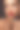 美丽的女人与明亮的红色嘴唇和口红在手图片下载