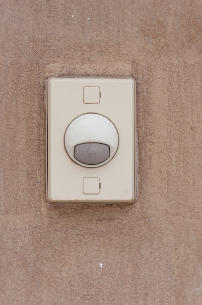 水泥墙上的门铃图片下载