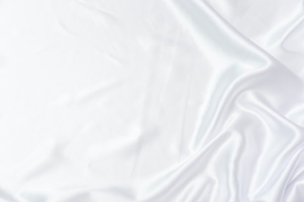 白色织物背景和纹理，褶皱的白色缎子抽象和设计图片下载
