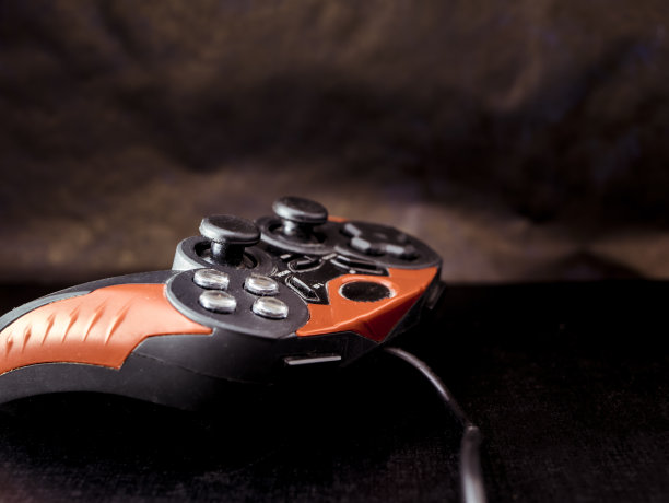 关闭游戏手柄控制杆的黑色表面素材图片