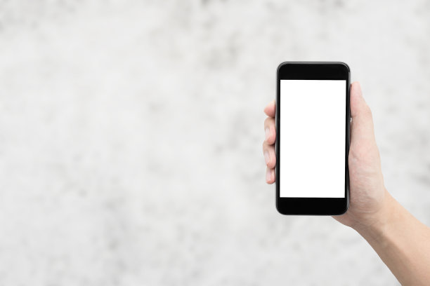 手持白色模型屏幕的智能手机图片下载