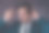 英俊的年轻男子在黑色西装梳头发的肖像图片下载
