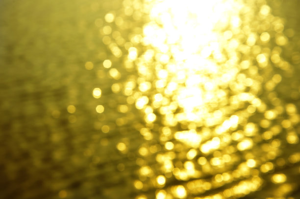 金色的散光的阳光在海浪海浪海浪夏天的背景图片下载