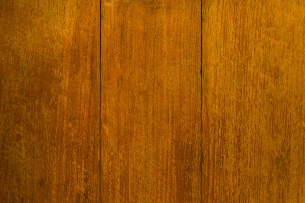 抽象质朴的表面深色木桌纹理背景。近景质朴的深色墙壁由白色木桌板纹理制成。质朴的深色木桌纹理背景空模板为您的设计。素材图片