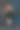 白人妇女穿着黑色衣服摆姿势在黑暗的工作室与铜光球。Full-lenght肖像图片下载