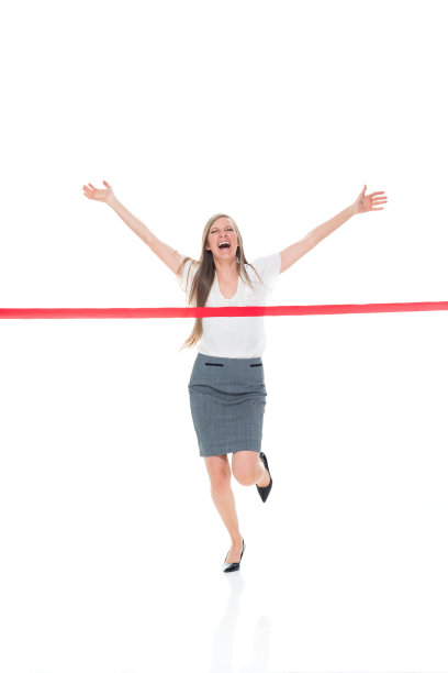 女商人跑过终点线图片下载
