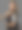 美丽的精灵女人在灰色的背景图片下载