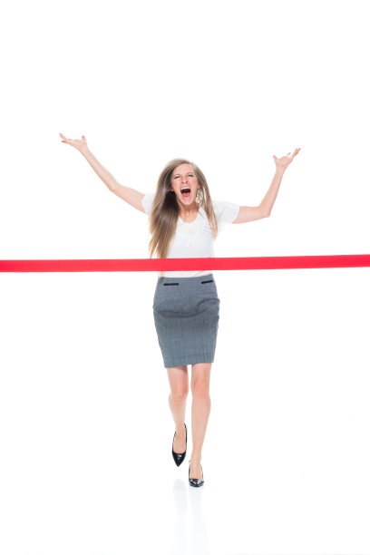 女商人跑过终点线图片下载