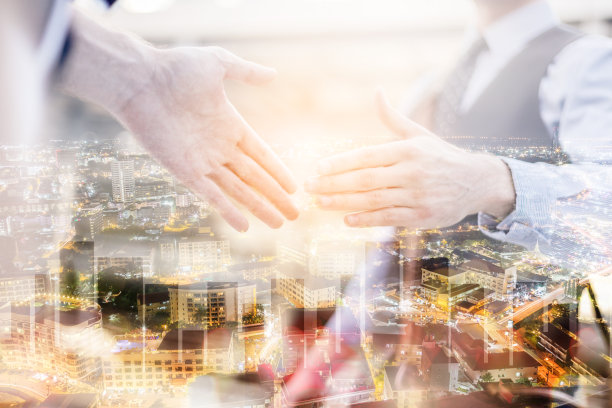 双曝光商业成功握手与灯光效果图片下载