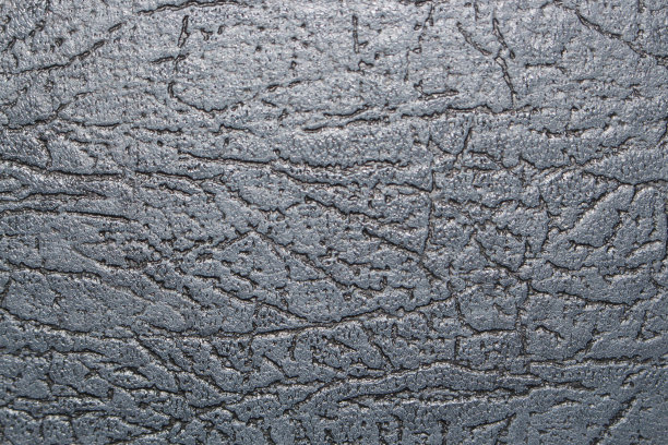 黑色皮革垃圾纹理。天然材料背景面设计沙发，布料，封面素材图片