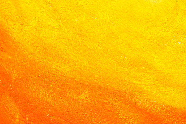 混凝土背景上未完成的橙色画。图片下载