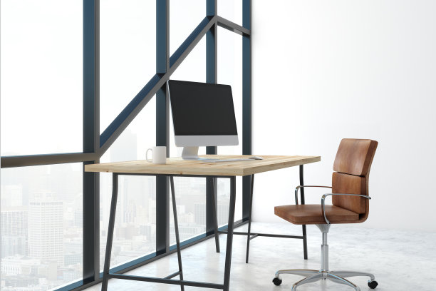 现代办公室与空的电脑显示器素材图片