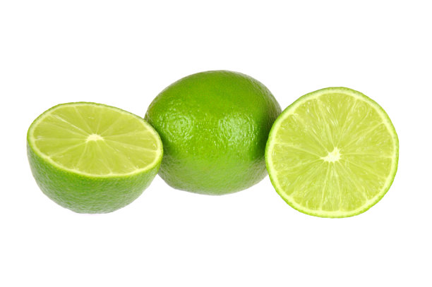 石灰，整个和切割孤立在白色背景素材图片