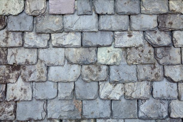 年代久远的石板瓦屋顶背景图片下载