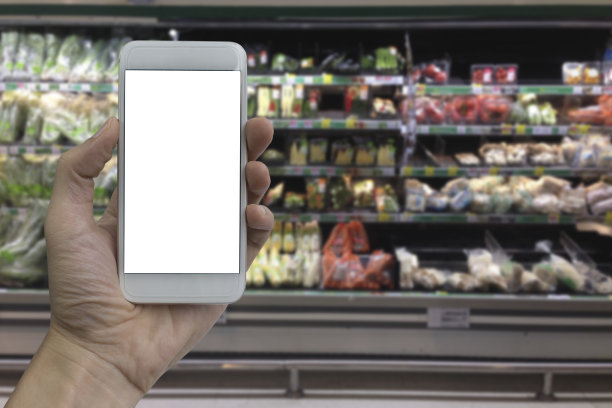 手持白色空白屏幕的智能手机图片下载