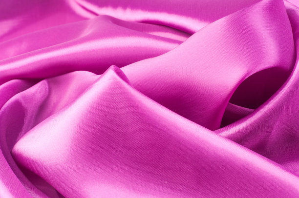 覆盆子色的织物。纹理图片下载