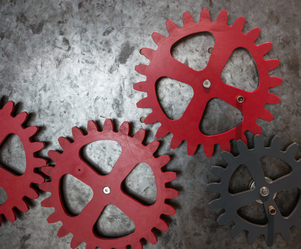 金属壁上机械装置的齿轮素材图片