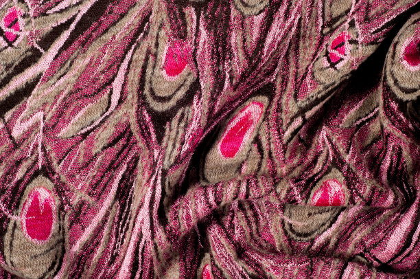 质地、背景、模式。羊毛女式毛衣，毛衣图案为孔雀羽毛图片下载