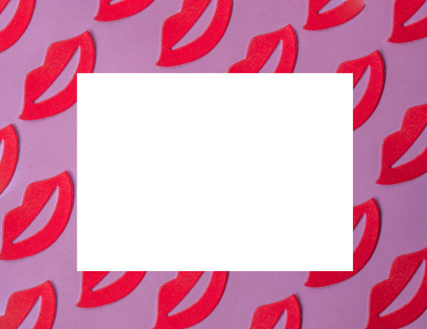 红色女性的嘴唇图案在粉红色的背景与复制空间图片下载