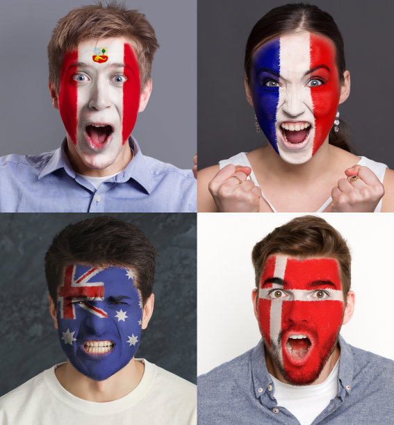 情绪激动的球迷脸上画着旗帜图片下载
