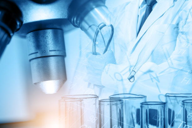 显微镜与实验室玻璃器皿，科学研究与发展的理念图片下载