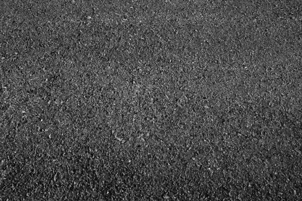 黑色沥青纹理背景。图片下载