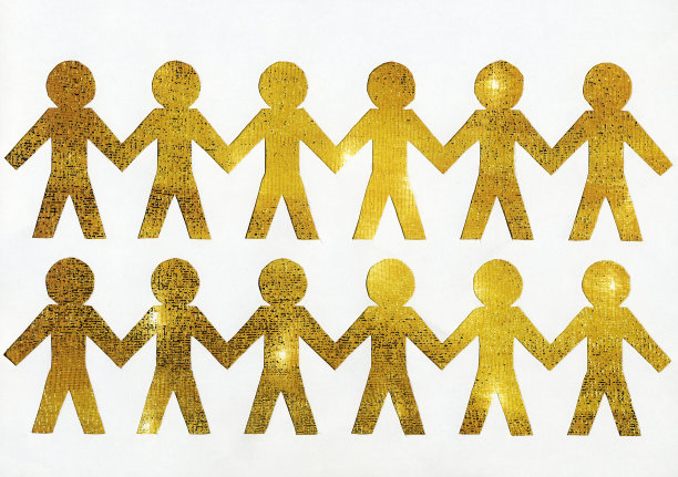 人是由金色的纸在白色的背景图片下载