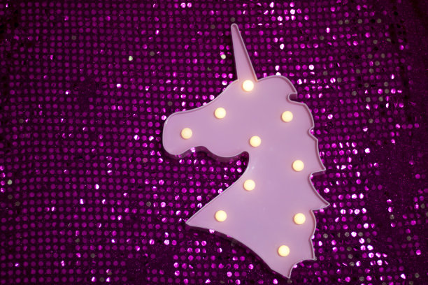 独角兽在美丽闪亮的纺织品图片下载