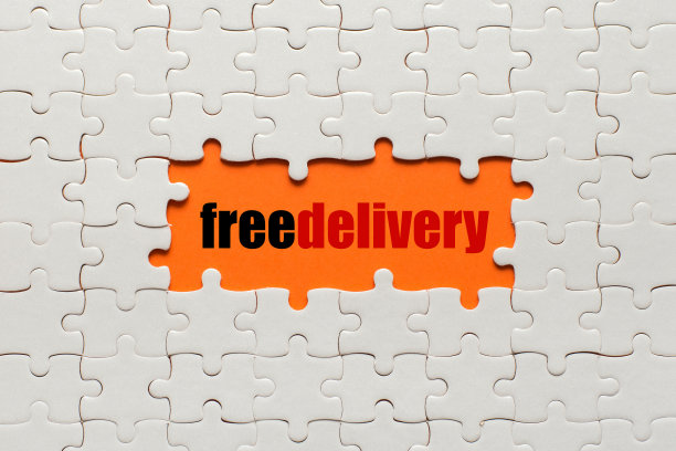 白色细节的拼图在橙色的背景和字免费交付图片下载