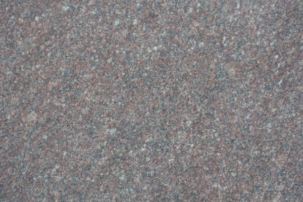 未抛光的灰粉色花岗岩表面图片下载