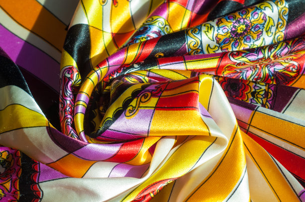 质地、背景、模式。布料丝绸抽象图案。存在于思想中或作为一种观念存在的由羊毛、棉花或类似纤维制成的梭织或毡织物。图片下载