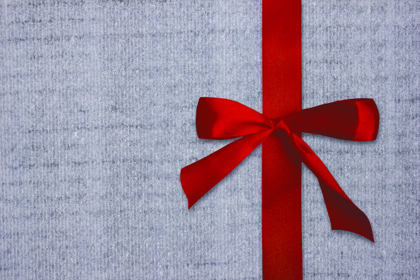 红色的缎带。背景、纹理的整理材料素材图片