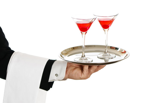 侍者拿着一个托盘和酒杯图片下载