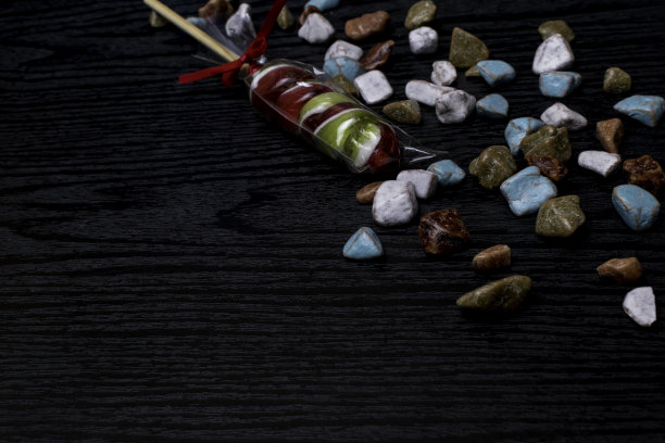 彩色焦糖松饼，糖果和螺旋棒棒糖。糖果的背景图片下载